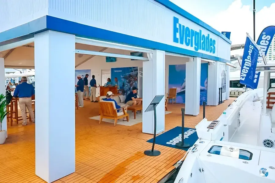 Everglades showroom booth with wooden furniture and marine displays