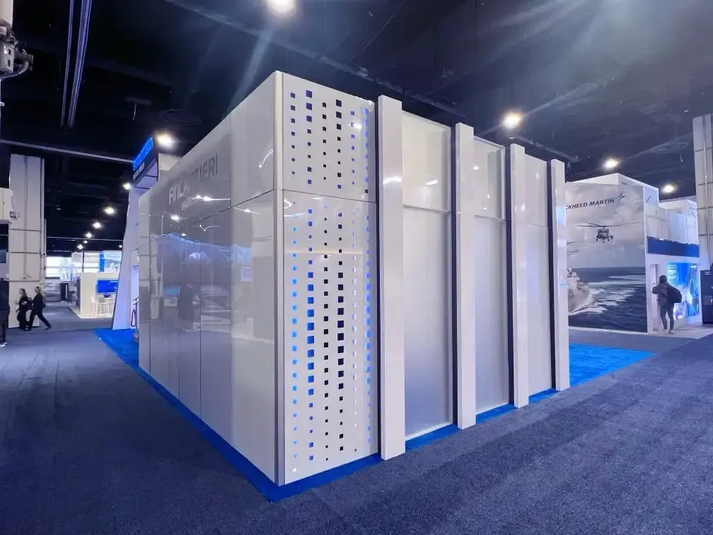 Fincantieri booth with white panels and blue lighting