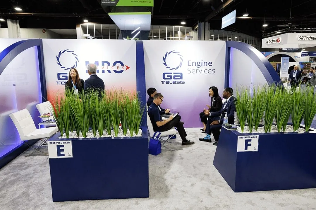 GA Telesis engine services hub with planters and lounge seating