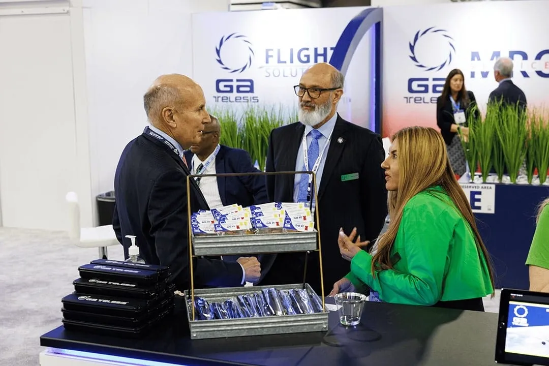 Visitors talking at a GA Telesis hospitality hub