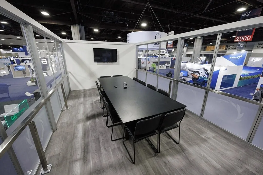 Glass-walled upper-deck meeting room in the GA Telesis exhibit