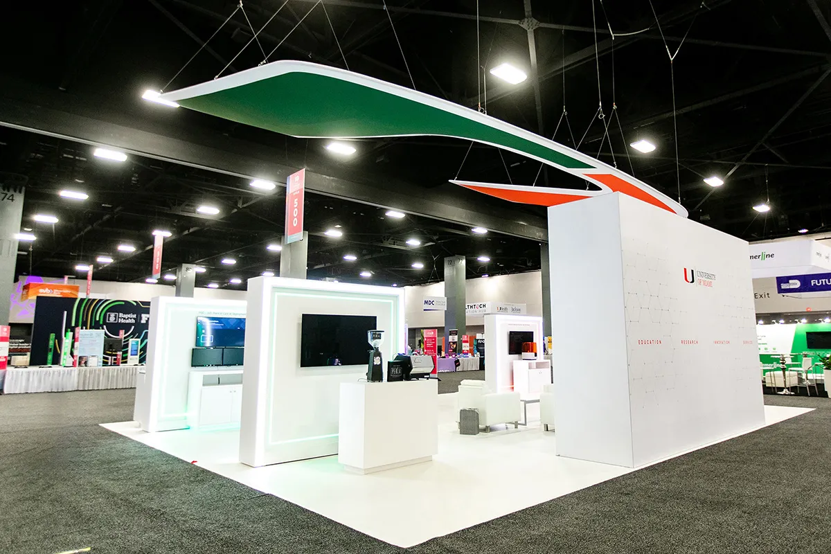 Side view of the University of Miami exhibit with video kiosks