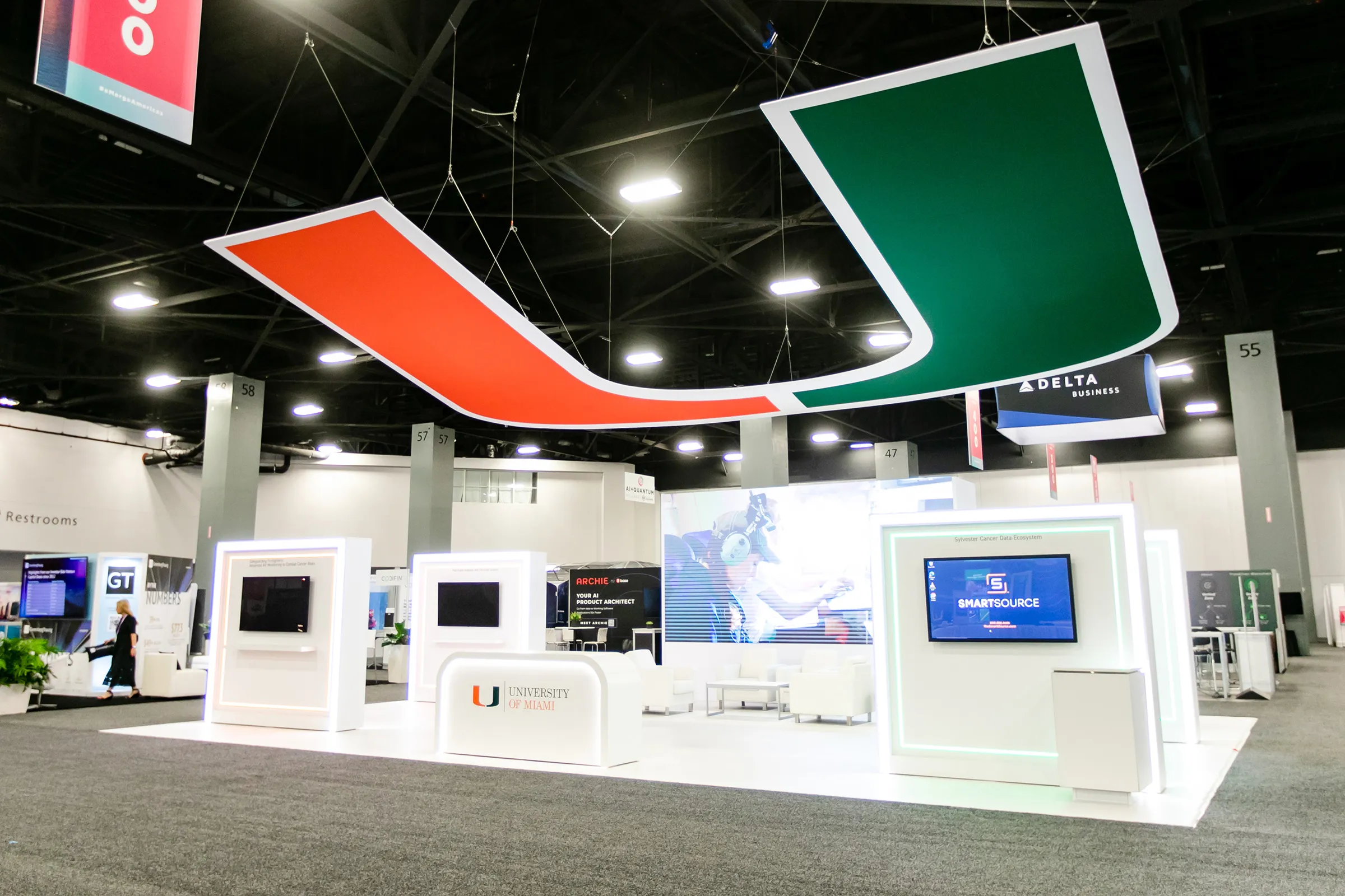 University of Miami island exhibit with the orange and green U suspended overhead
