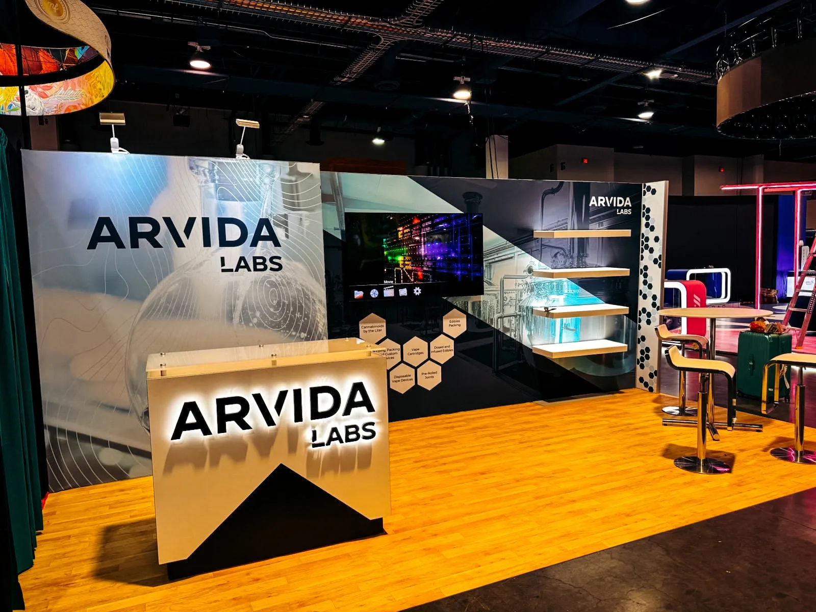 Exhibit Craft portable display for trade shows featuring a modern Arvida Labs booth setup