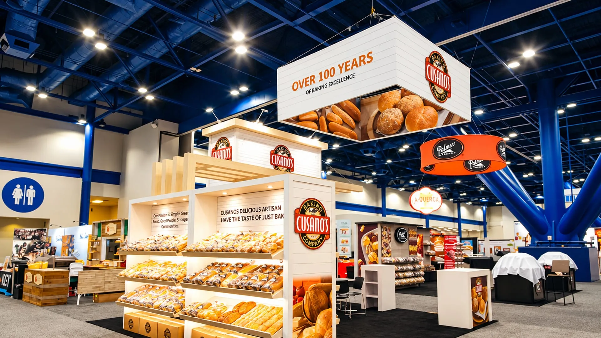 Cusano’s Baking Company island exhibit with a hanging sign and bread displays